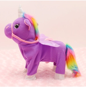 Detail of purple plush unicorn with rainbow mane and shiny silver wings on pink background