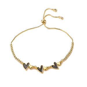 Bracciale a sfere dorate regolabile con cuori neri e lucidi alternati in serie