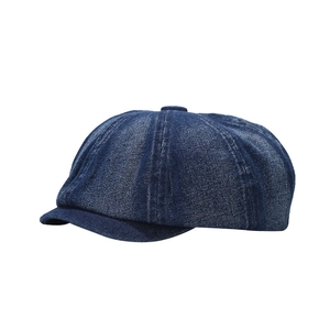 Classic dark blue denim newsboy cap with octagonal design and washed twill texture
