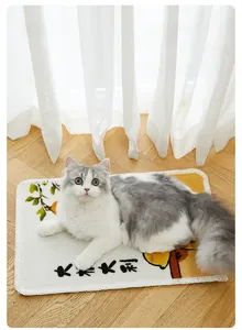 Detailed view of a durable sisal cat scratching mat with orange pattern and cat resting