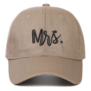 Khaki cotton twill baseball cap featuring black Mrs. embroidery on a plain white background