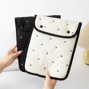 Quilted polka dot tablet sleeve with magnetic buttons for 11 and 13 inch laptops
