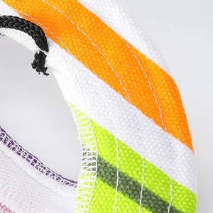 Detailed close-up of colorful striped canvas fabric with reinforced stitching and texture