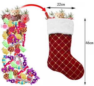 Red velvet Christmas stocking with gold sequins, faux fur trim, and gift decorations