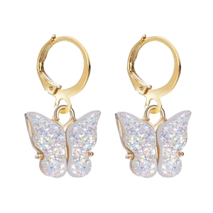 Golden lever-back butterfly earrings with iridescent white glitter fill on white background