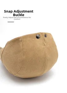 Detail of adjustable metal buckle on khaki newsboy cap for head circumference comfort