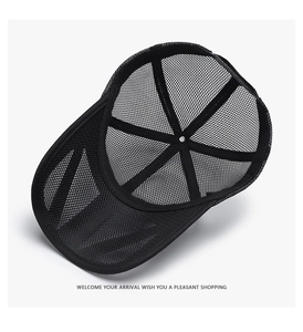 Detail view of the breathable black mesh fabric and structure of the summer baseball cap