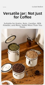 Detail of white stainless steel storage canister with metal airtight lid buckle and seal