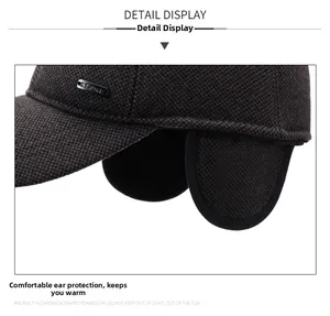 Detail view of thickened ear flaps and wool blend texture on men's winter baseball cap