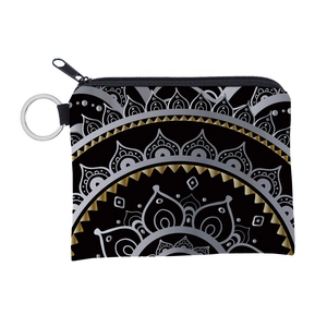 Detail of black fabric coin purse with gold mandala print and metal keychain clip