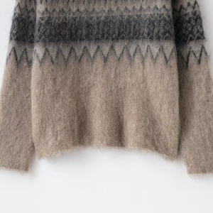 Retro oversized knit sweater with fuzzy mohair texture and gray zigzag pattern