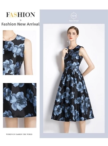 Detail of a navy sleeveless A-line dress featuring blue floral jacquard satin fabric