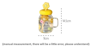 Detail view of transparent flower glass cup with dimensions 14.5cm height and 9cm width