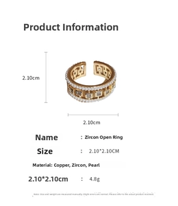 Detailed view of gold square zircon ring with micro-set pearls and 2.10cm size dimensions