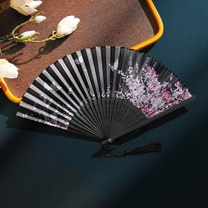 Elegant black folding fan with pink flowers, white butterflies and black tassel detail