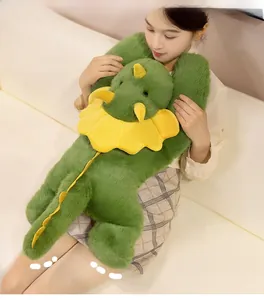 Cozy forest green triceratops plush toy held by a person on a soft sofa