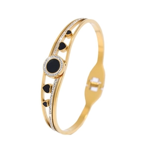 Gold double-layered open bangle with black heart and round charms set with tiny crystals
