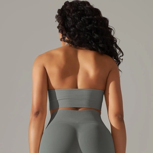 Close-up back view of grey seamless ribbed knit sports bra showing texture and fit