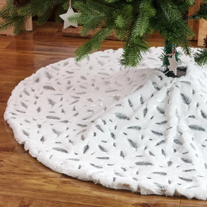 Round white faux fur Christmas tree skirt with decorative silver foil feather patterns