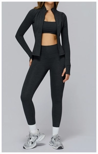 Close-up of dark grey brushed fitness set featuring zipper jacket and high waist leggings