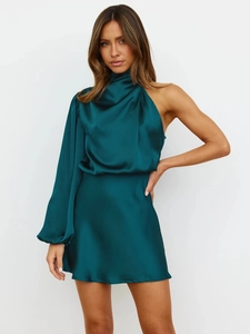 Detail of elegant emerald green satin dress featuring asymmetrical one-shoulder and lantern sleeve
