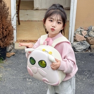 Cute eggshell kitten backpack for kids featuring cat ears and large green eyes