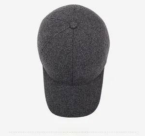 Top-down view of grey wool-blend baseball cap showing detailed fabric texture