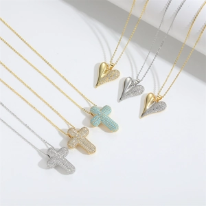 Chic gold and silver cross and heart pendant necklaces with shimmering cubic zirconia