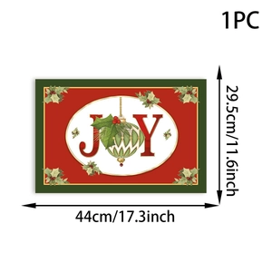 Detailed view of Joy Christmas placemat with red and green design and size dimensions