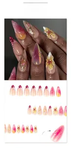 Macro detail of almond press-on nails with 3D floral relief and leopard gradient design