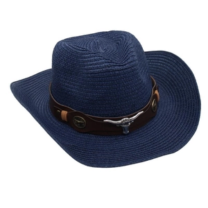 Close-up view of a navy blue straw cowboy hat featuring a leather band and bull head ornament
