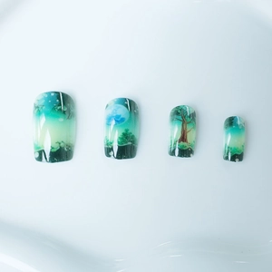 Starry forest night sky press-on nails with green landscape and moon art on short square tips