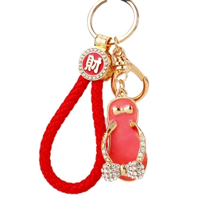 Chinese red woven keychain with sparkling rhinestones, lucky coin and pink flip-flop charm