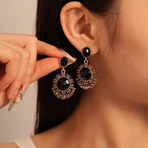 Boucles d'oreilles vintage tournesol or avec cristal noir et strass étincelants