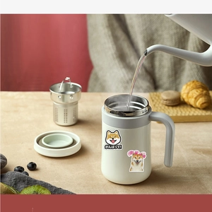 Detail of cute Shiba Inu stickers on a white mug during a warm afternoon tea scene
