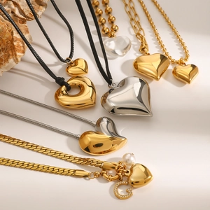 Variety of stainless steel heart pendant necklaces in gold and silver with elegant chains