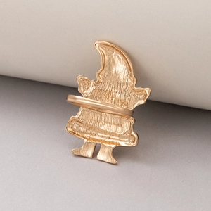 Detail showing the textured metal back and weld joint of the Christmas gnome ring