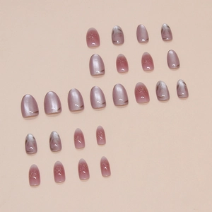 Short almond press-on nails with purple cat-eye gradient and gold foil accents