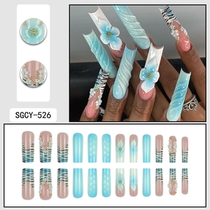3D floral blue press-on nails with pearls, zebra patterns, and star rhinestone accents