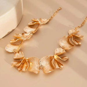Vintage textured golden petal necklace with irregular metallic leaves and adjustable chain