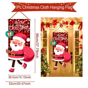 Detail of red and black plaid Christmas door banner with Santa Claus and gift bag motifs
