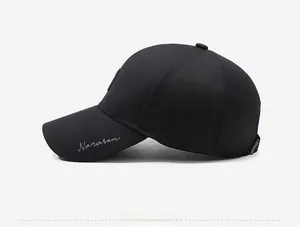 Side view of black cotton baseball cap showing Narason embroidery and curved brim detail