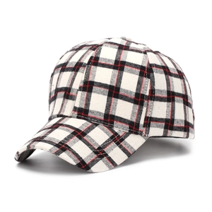 Detail shot of the British style plaid baseball cap with classic red and black patterns
