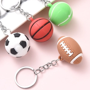 Variety of sports ball keychains including soccer, basketball, tennis, and rugby pendants