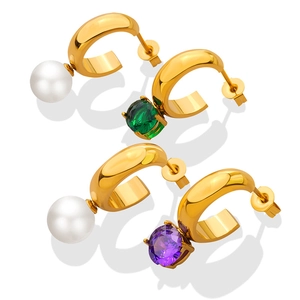Gold C-shaped stud earrings with pearls and colorful zircon stones in a sleek design