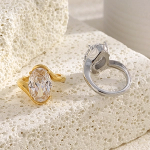 Minimalist 18K gold and silver stainless steel rings with oval cubic zirconia stones