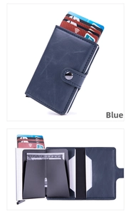 Detail view of the blue RFID blocking card holder showing the pop-up aluminum mechanism