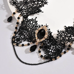 Gothic black lace choker necklace with gold layered chains and dark gemstone pendants