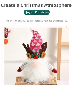Detailed view of plush Christmas gnome with reindeer antlers and knit hat with golden bells
