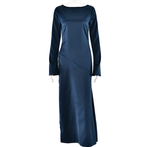 Detail view of navy blue long sleeve satin maxi dress with elegant diagonal waist stitching